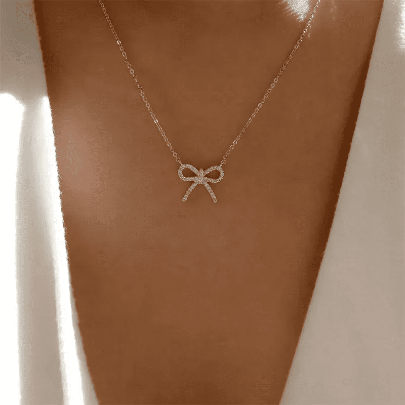 Elegant Gold Bow Pendant Necklace with Chain Perfect for Casual and Formal Occasions Stylish Jewellery for Women.