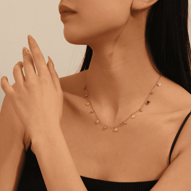 Gold Heart Charm Necklace Elegant and Stylish Jewellery for Women Perfect Gift for Everyday and Ethnic wear jewellery.